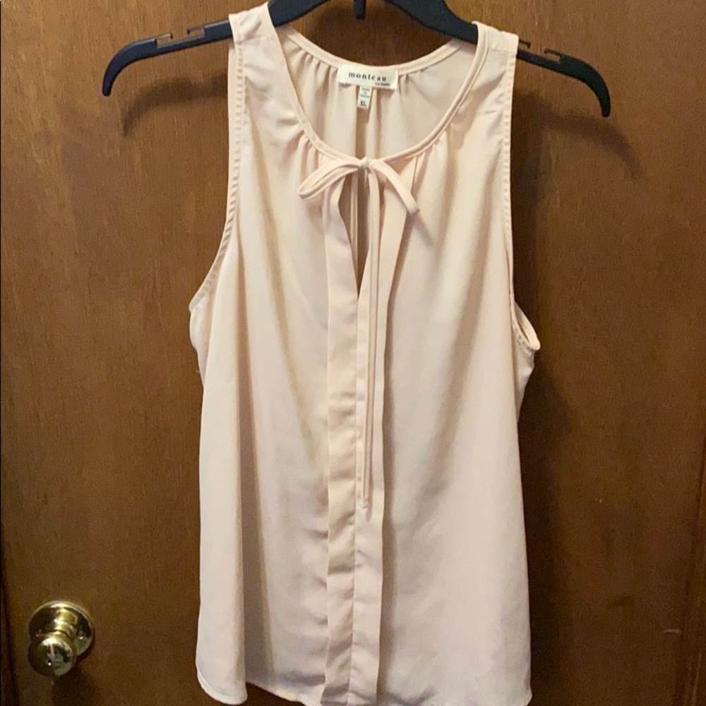 Pink sleeveless blouse